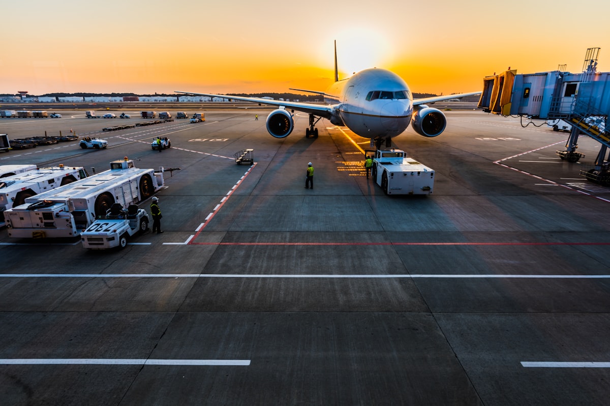 Aircraft at the terminal gate at sunrise